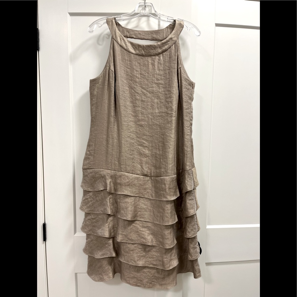 Formal dress - short, gold colour.  Beautiful back.
